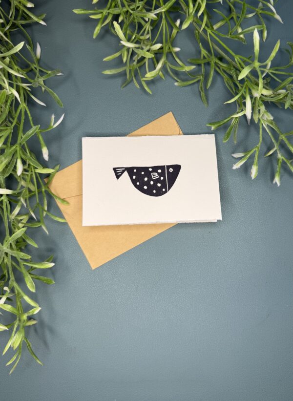 1 Fish A mini card with a single fish design on a green background with a plant